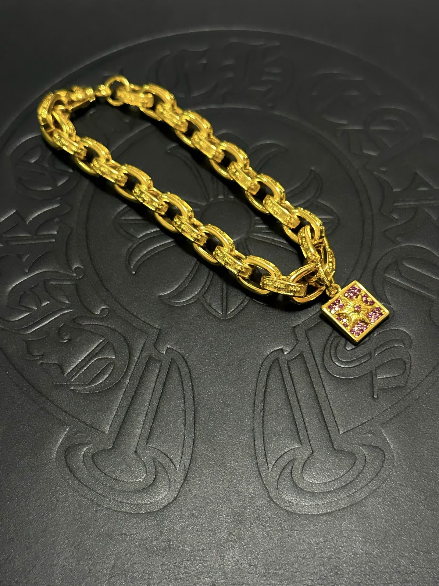 Chrome Hearts Gold Tone Bracelet with Pink Crystal Charm